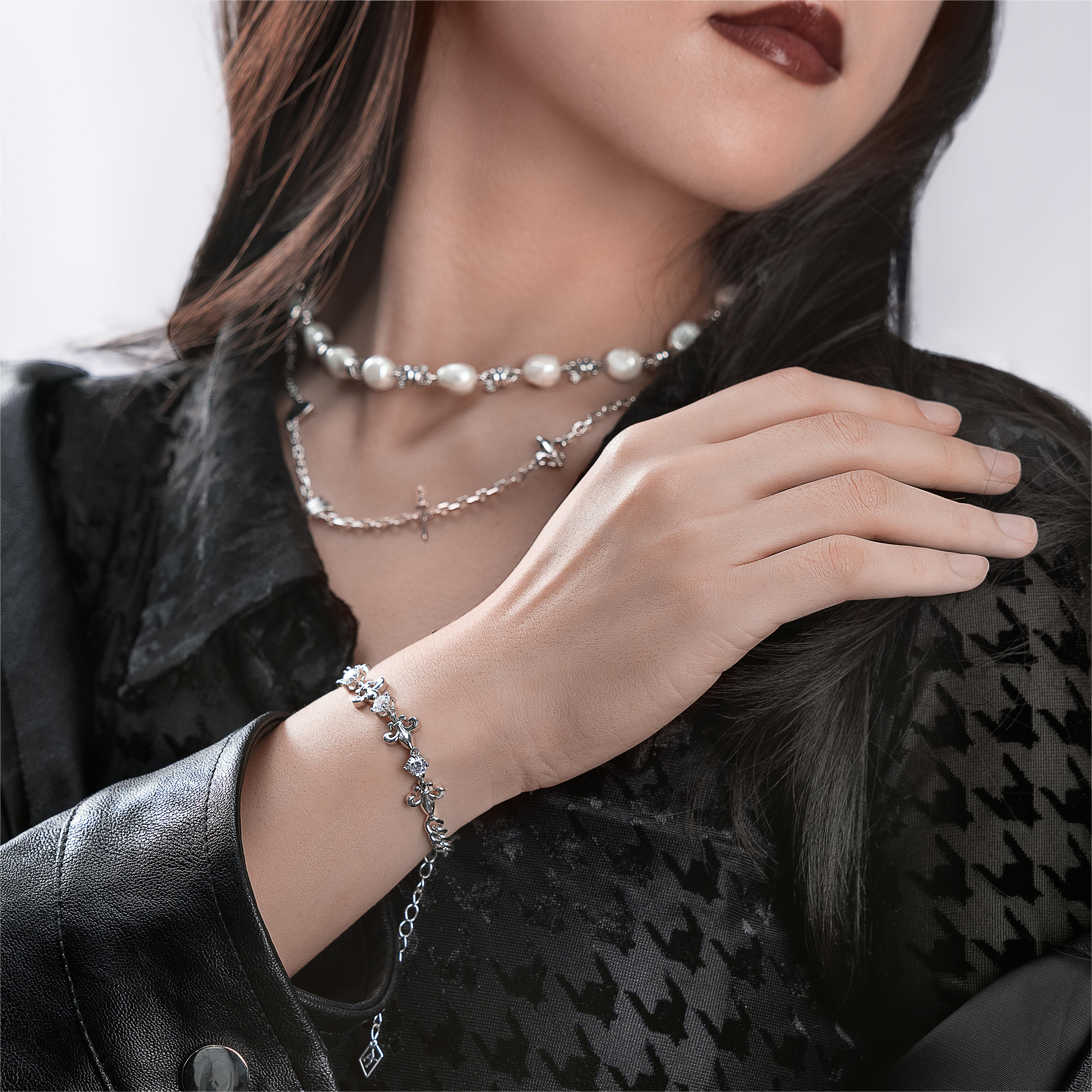 Bracciale cubano regolabile da Fleur de lis - 4 mm [solo negli Stati Uniti]