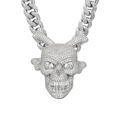 Pendentif tête de mort et os croisés en rotation
