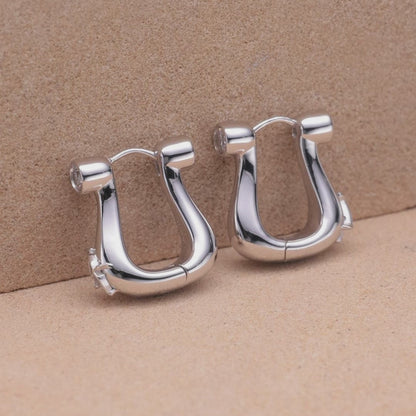 Boucle d'oreille créole dorée unie en forme de fer à cheval